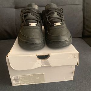 Nike Air Force 1s, black low top